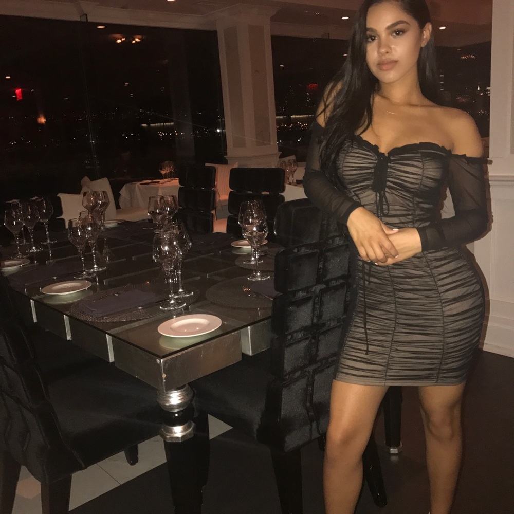 Black & beige long sleeve bodycon dress.